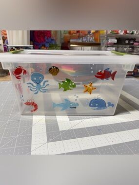 Decorated storage bin with lid. Colorful sea creatures design. Like new!